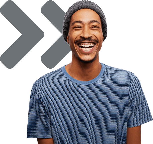 man smiling with striped blue shirt